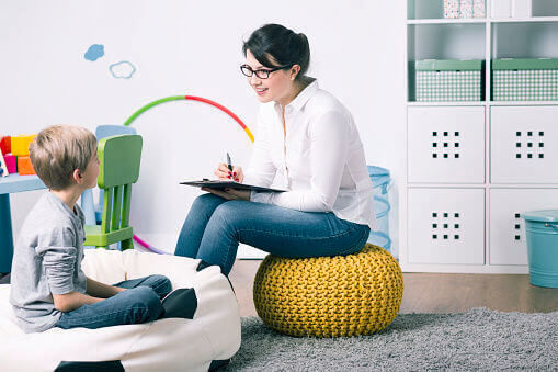 Woman helping a child with education